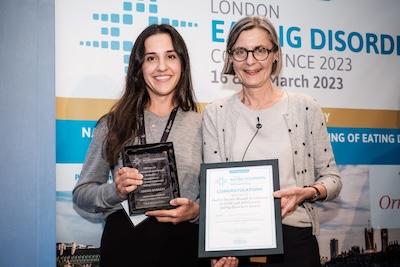 InsideOut Institute staff receiving research impact and innovation awards