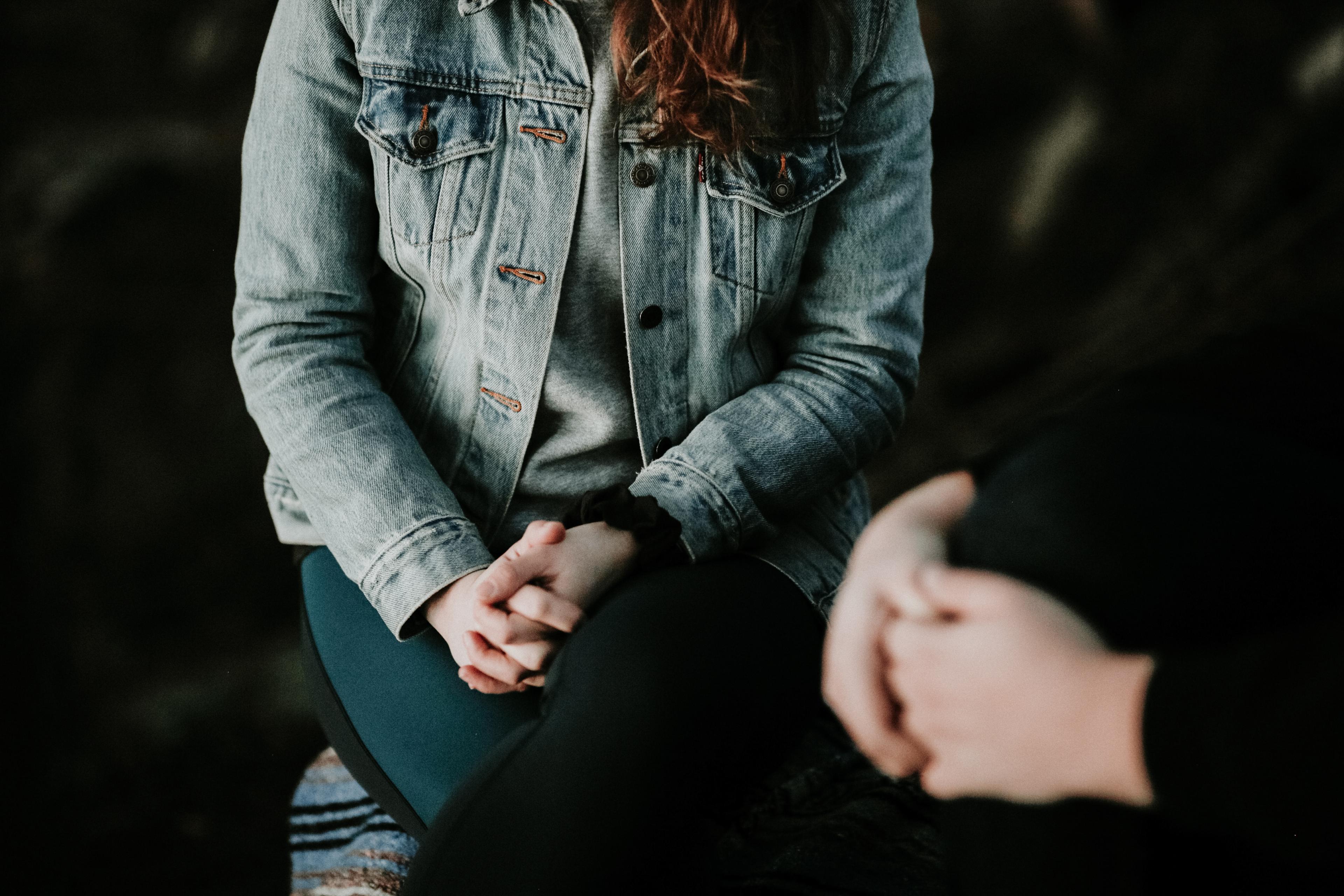 Two Young Woman talking together