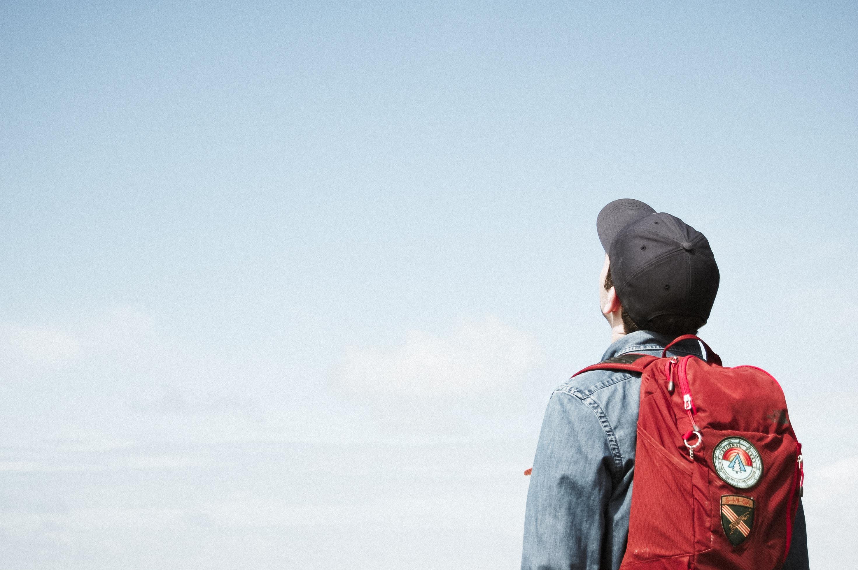 A Hiker looking up at sky